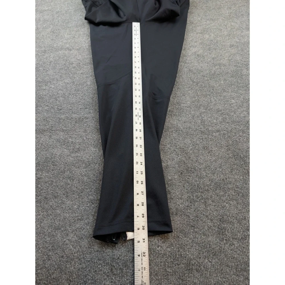 Under Armour Mens Track Pants Size 2XL Black White Stripe Ankle Zippers 1313201